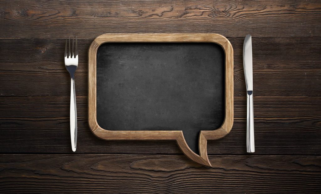 Marlin Connections Products and Services: Chalkboard in the shape of a speech bubble next to a fork and knife